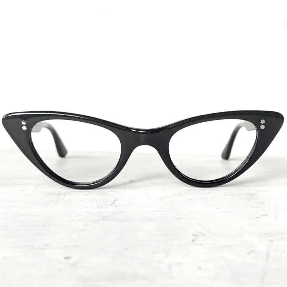 Vintage cat frame glasses by France Swank. Mint condition.